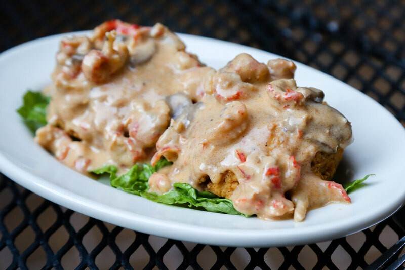 Mambo's Louisiana crab cakes topped with crawfish and mushroom cream sauce
